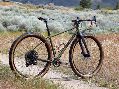 Custom steel gravel bike with clearance for XC race tires