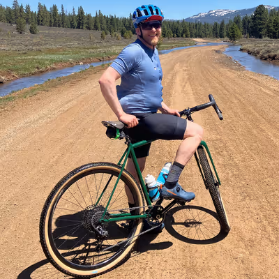 Max carves a corner on his gravel bike.